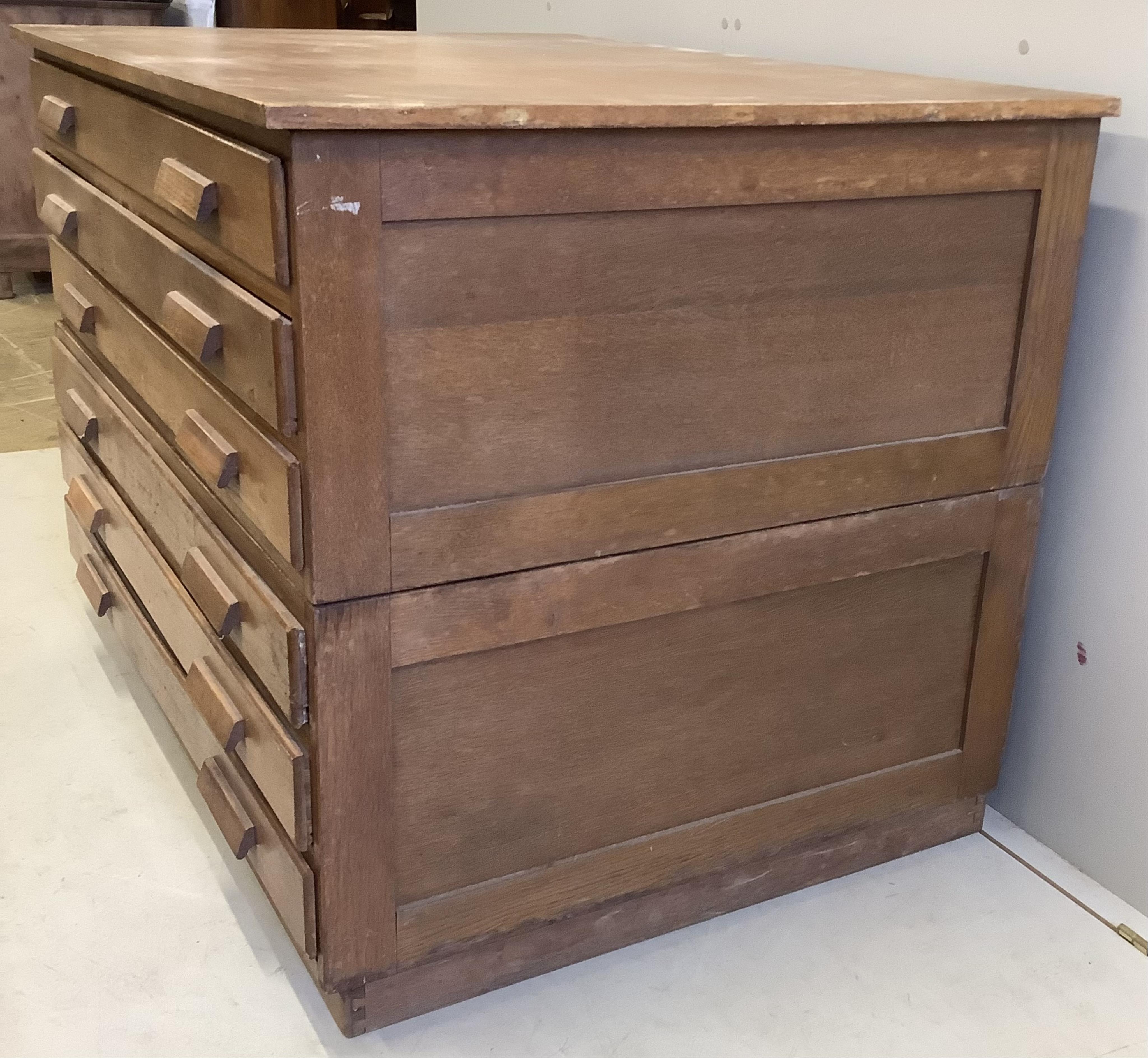 A mid century oak plan chest, width 120cm, depth 88cm, height 86cm